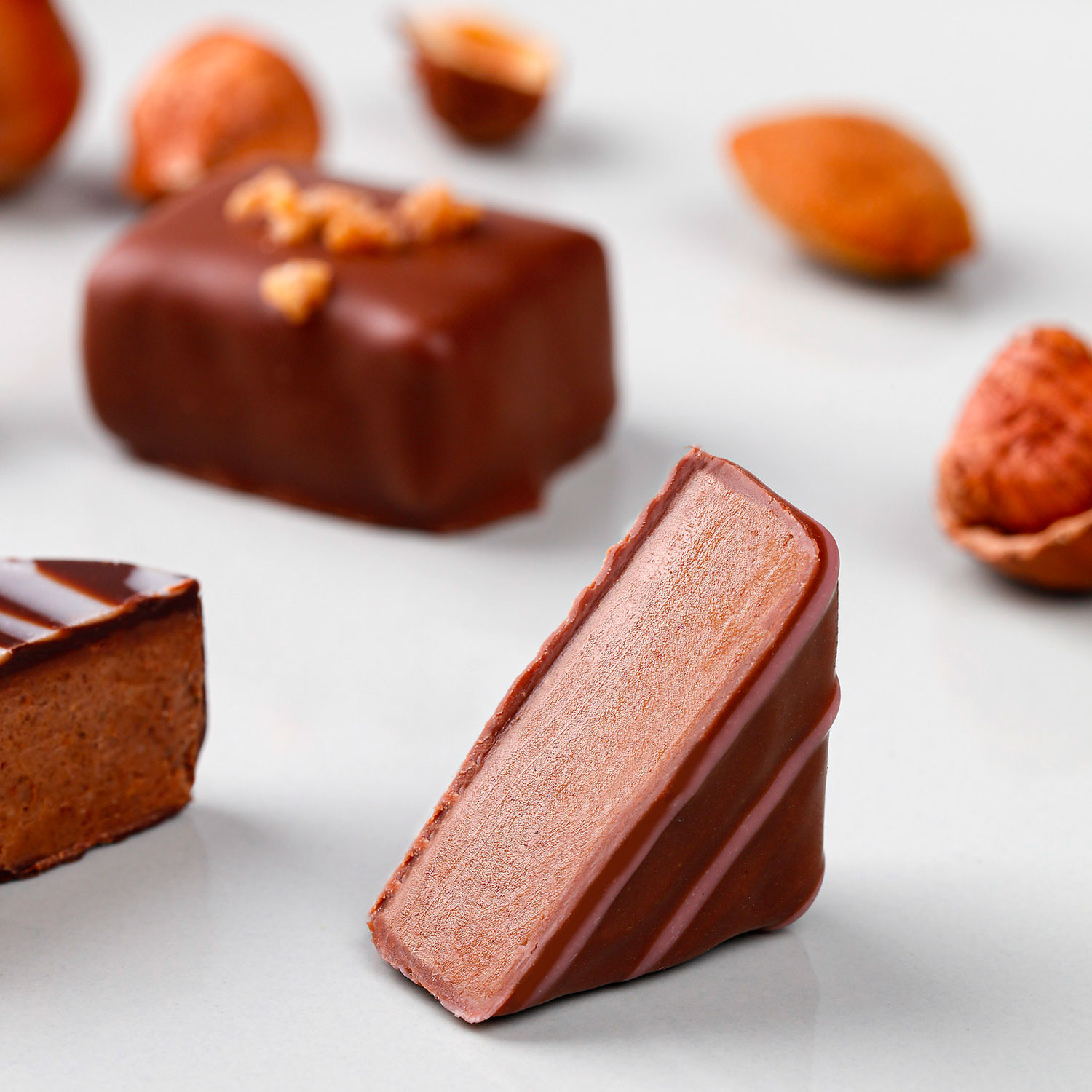 Bonbon chocolaté fourrés à l'orange confite & au pralin - Recette